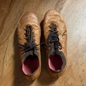 Copper Athletic Nike Cleats with Pink Lining
